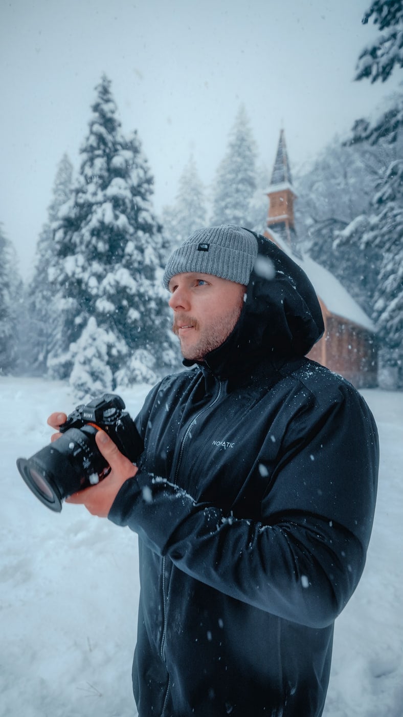 Max shooting in heavy snow in winter Yosemite