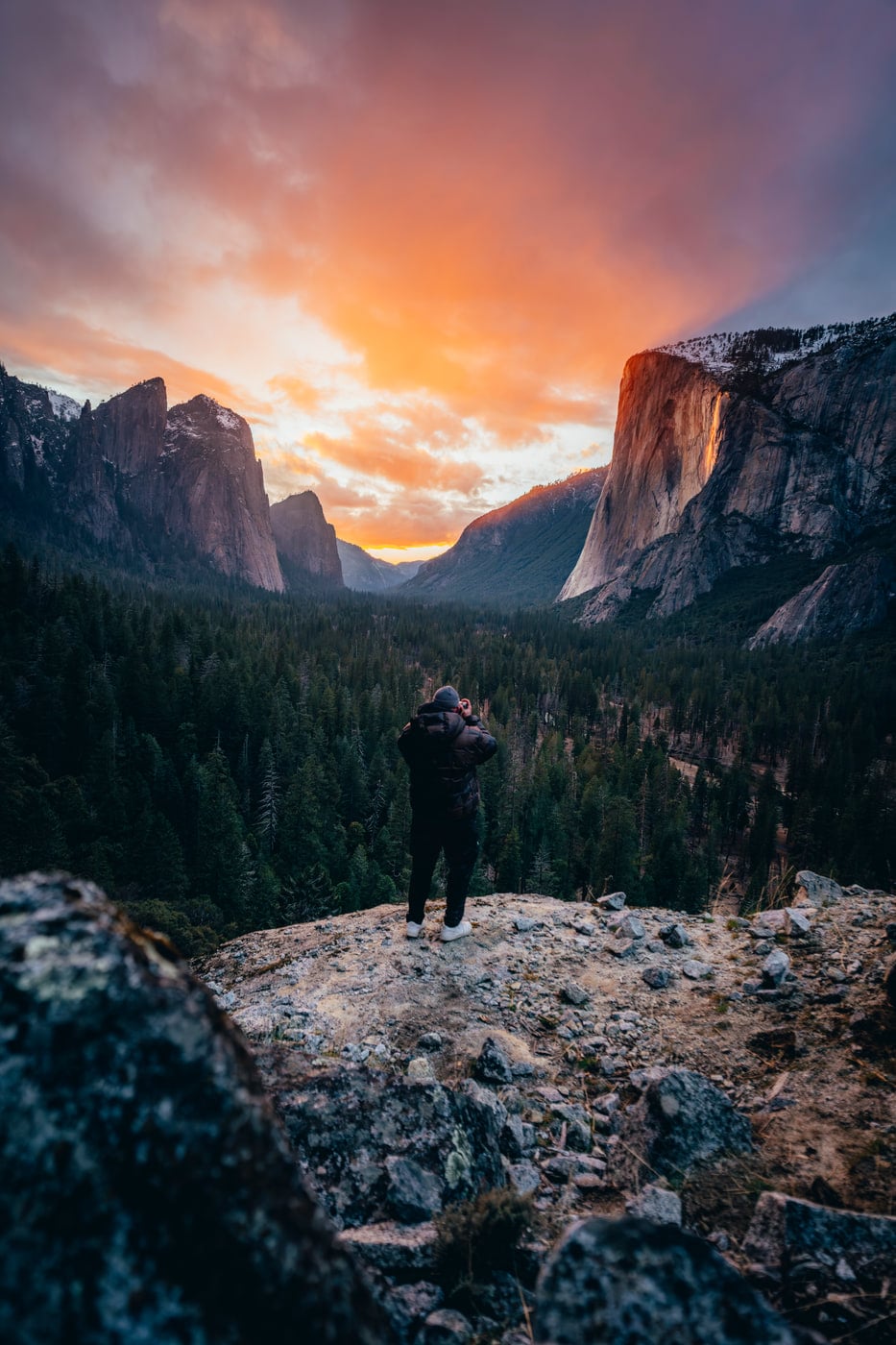 Max shooting the Yosemite valley at a fiery sunset from Tunnel View