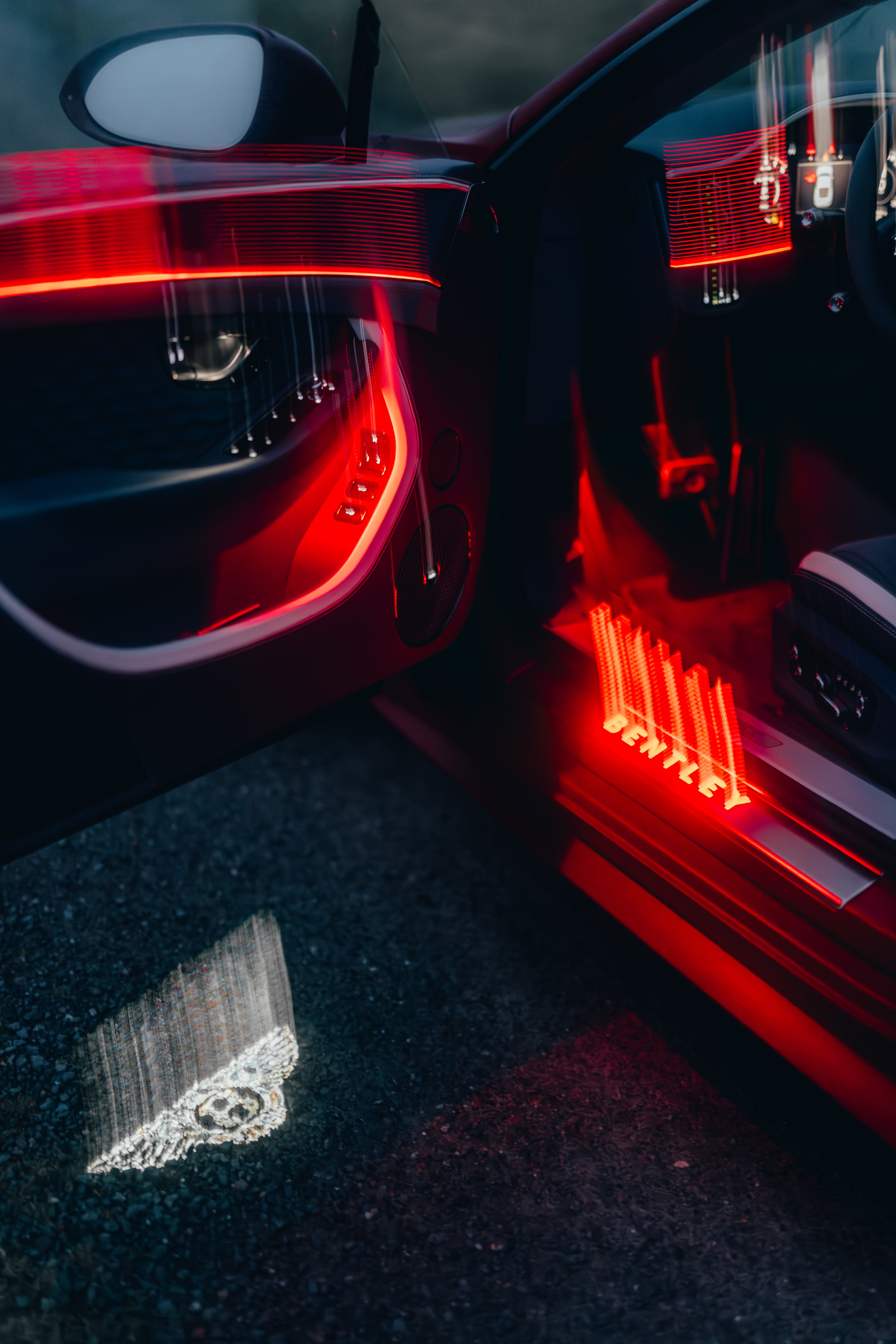 BENTLEY sill plate, welcome light projecting the wings on gravel