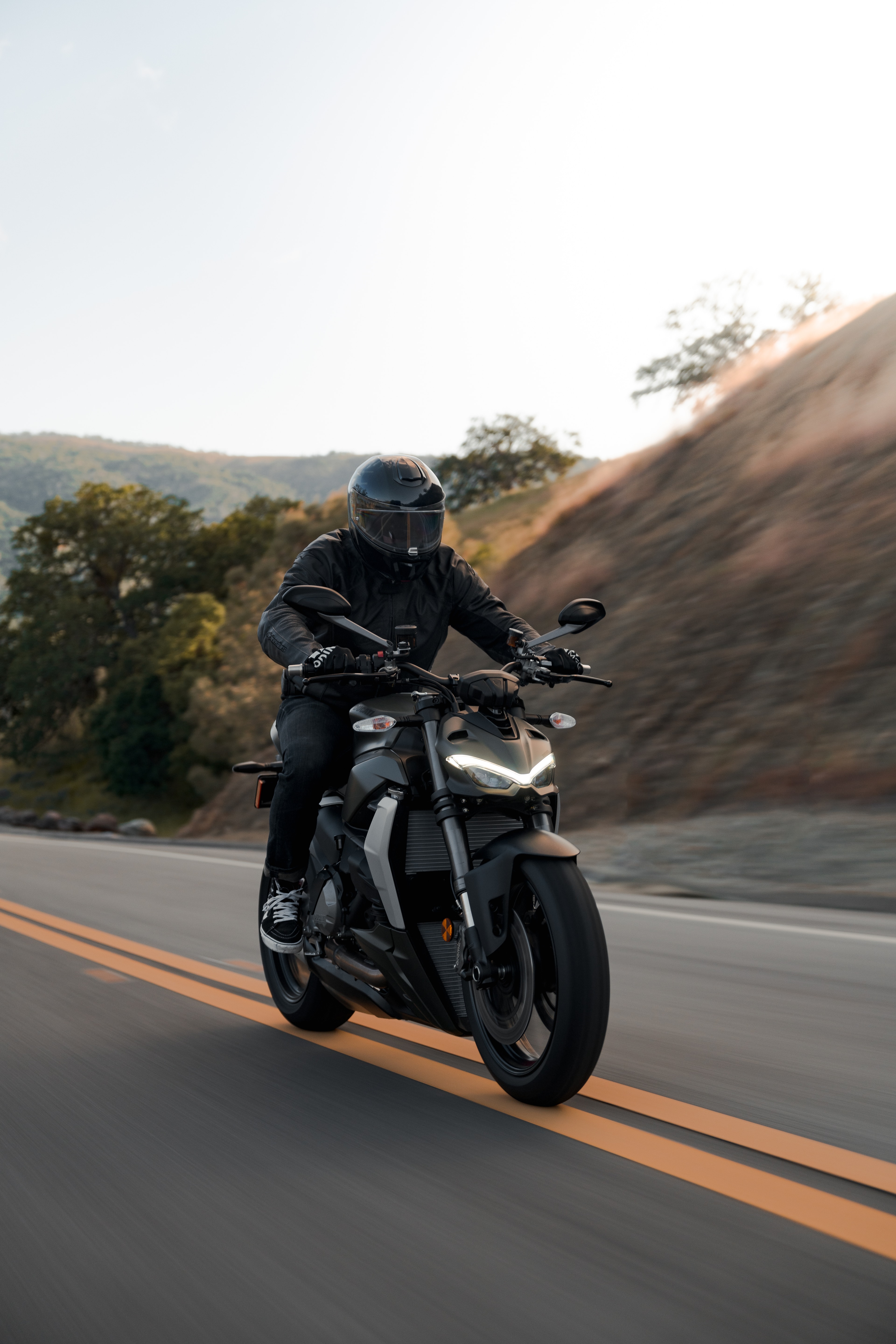 Ducati Street Fighter rider on a sunny Bay Area mountain road