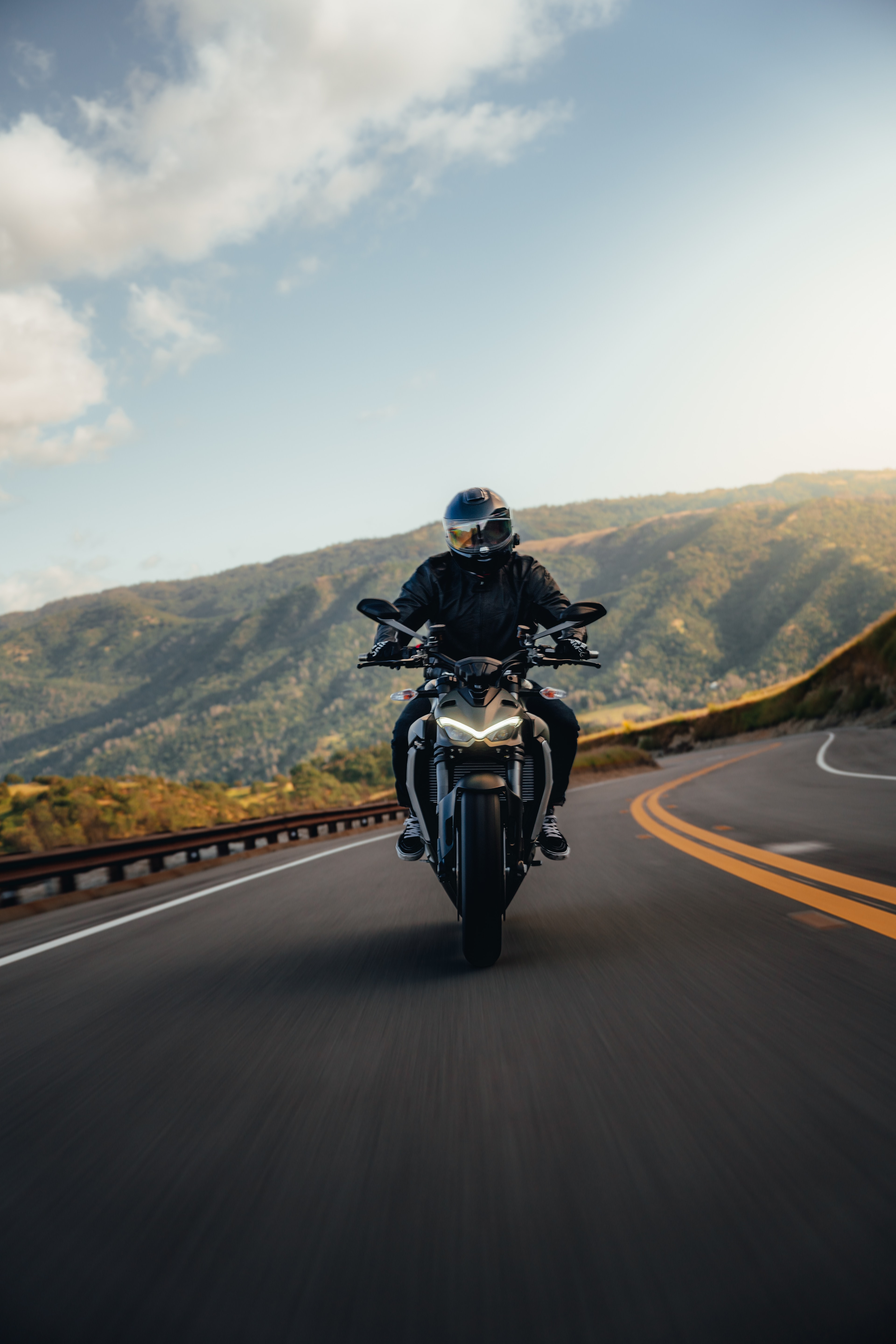 Ducati Street Fighter — naked sportbike detail, sun behind