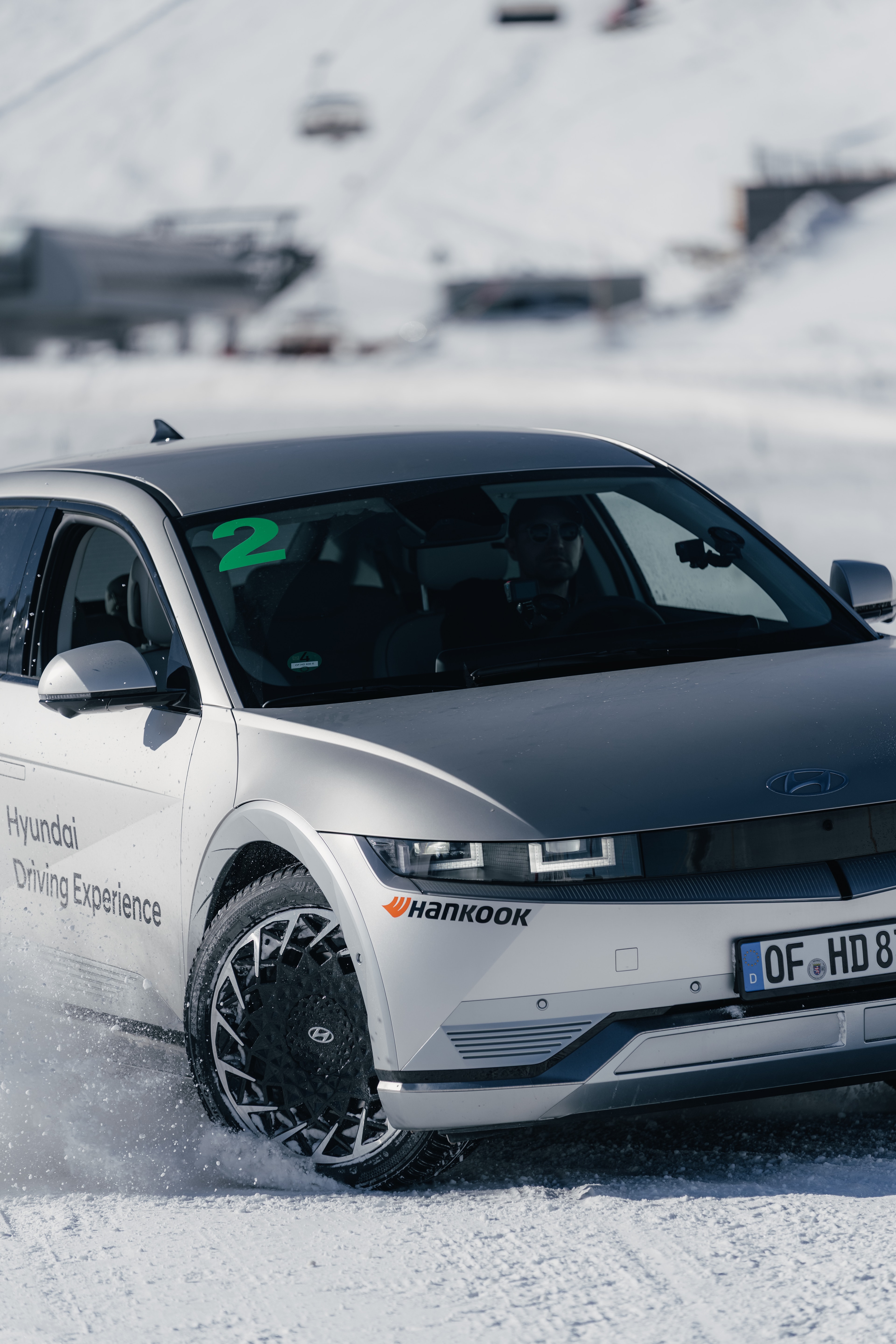 Hyundai IONIQ 5 at the Driving Experience, race number 2, ski lift behind