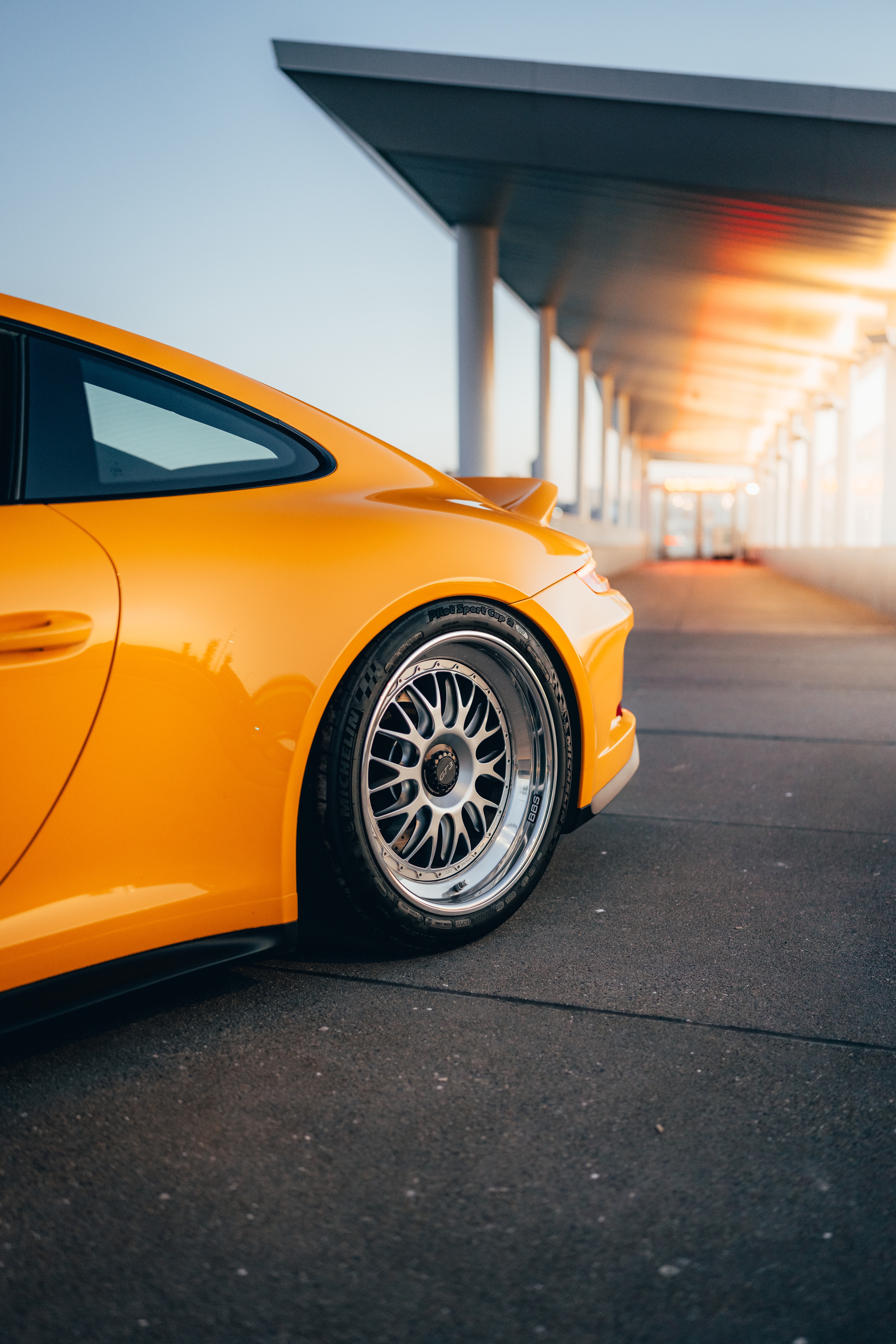Quarter-panel and wheel detail of the 911 GT3 at golden hour